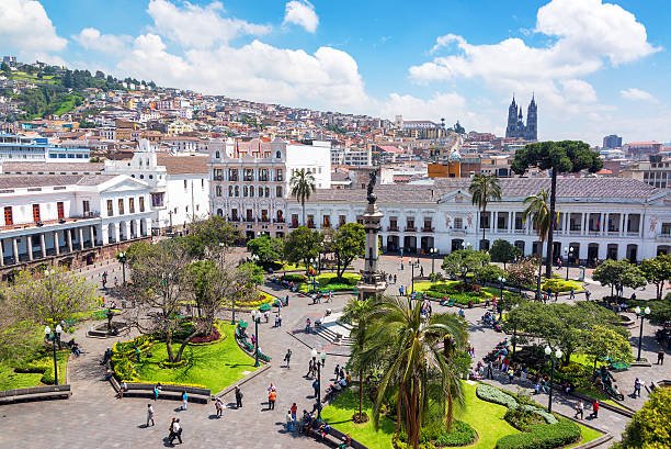 Quito, Ecuador - March 6, 2015: Activity in the Plaza Grande in the colonial center of Quito, Ecuador on March 6, 2015